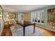 Dining room offering hard wood floors and a large window with a view of the home's exterior at 104 Perth Ct, Cary, NC 27511