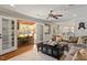 Cozy living room with fireplace, comfortable seating, and natural light at 104 Perth Ct, Cary, NC 27511