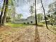 Expansive backyard with ample space for outdoor activities and potential landscaping opportunities at 1100 Medlin Dr, Cary, NC 27511