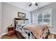 Cozy bedroom with a queen-sized bed, a nightstand, and a bright window at 1165 Shonele Ln, Stem, NC 27581