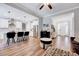 Spacious living area offering open floorplan with kitchen and dining areas at 1165 Shonele Ln, Stem, NC 27581