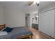 This bedroom offers wood-look flooring, neutral paint, an adjacent bathroom with vanity, and a closet at 120 Schultz St, Chapel Hill, NC 27514