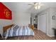Bedroom with a bed, a ceiling fan, and a view of the en-suite bathroom at 120 Schultz St, Chapel Hill, NC 27514