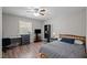 Bedroom with a bed, a desk, and a view of the window at 120 Schultz St, Chapel Hill, NC 27514