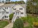 Inviting two-story townhouse with a charming entrance and well-manicured landscaping at 120 Schultz St, Chapel Hill, NC 27514