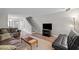 Comfortable living room with hardwood floors, neutral paint, and a cozy seating area at 120 Schultz St, Chapel Hill, NC 27514