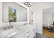 Elegant bathroom featuring a double vanity with marble countertop and modern fixtures, offering style and functionality at 1200 Roosevelt Dr, Chapel Hill, NC 27514