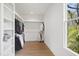 Well-organized walk-in closet with ample storage and natural light, making organization effortless and stylish at 1200 Roosevelt Dr, Chapel Hill, NC 27514