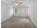 The bedroom boasts a spacious interior with carpet, offering a blank canvas for customization at 1206 Kafka Dr, Fuquay Varina, NC 27526