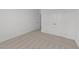 Bedroom with neutral carpet, closet, and ensuite bathroom at 125 Summerlin Dr, Clayton, NC 27527