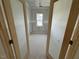 Bedroom with frosted glass french doors, adding a touch of elegance and privacy at 125 Summerlin Dr, Clayton, NC 27527