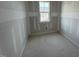 Bedroom with a window at 125 Summerlin Dr, Clayton, NC 27527