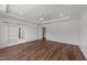 Bedroom featuring hardwood floors and a view to back yard at 125 Summerlin Dr, Clayton, NC 27527