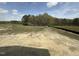 Image of homesite surrounded by trees in a beautiful community, great opportunity to build your dream home at 125 Summerlin Dr, Clayton, NC 27527