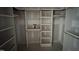 A well-organized walk-in closet with custom shelving and ample hanging space for clothing and accessories at 125 Summerlin Dr, Clayton, NC 27527