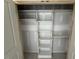 Walk-in closet with custom shelving, closet rods, and ample storage at 125 Summerlin Dr, Clayton, NC 27527