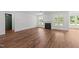 Spacious living room featuring hardwood floors and a cozy fireplace at 125 Summerlin Dr, Clayton, NC 27527