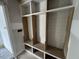 Unfinished mudroom featuring cubbies and storage at 125 Summerlin Dr, Clayton, NC 27527