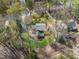 Overhead view of home showing roof line, large yard and mature trees at 1302 Hermitage Rd, Sanford, NC 27330