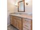 Bathroom vanity with wood cabinets and marble countertop at 1302 Hermitage Rd, Sanford, NC 27330