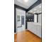 Bathroom with black accent wall, tile floors, and double sink at 1302 Hermitage Rd, Sanford, NC 27330