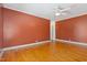 Bedroom with hardwood floors and ceiling fan at 1302 Hermitage Rd, Sanford, NC 27330