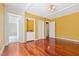 Bedroom featuring hardwood floors, en suite bathroom and multiple closets at 1302 Hermitage Rd, Sanford, NC 27330