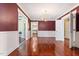 Dining room with hardwood floors, chandelier, and a bright interior at 1302 Hermitage Rd, Sanford, NC 27330