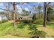 Two-story home on a sprawling lot with mature trees and lush landscaping at 1302 Hermitage Rd, Sanford, NC 27330
