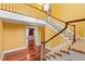 Elegant foyer with hardwood floors and a staircase at 1302 Hermitage Rd, Sanford, NC 27330