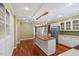 Spacious kitchen features an island with wood countertop, stainless appliances and hardwood flooring at 1302 Hermitage Rd, Sanford, NC 27330