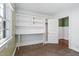 Home office features built-in shelving and desk with a closet for extra storage at 1302 Hermitage Rd, Sanford, NC 27330