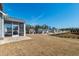 Large backyard with expansive lawn and screened-in porch, perfect for outdoor activities and relaxation at 139 Pronghorn Deer Ct, Garner, NC 27529