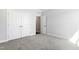 Bedroom with double-door closet, standard closet, neutral paint, and plush carpet at 139 Pronghorn Deer Ct, Garner, NC 27529