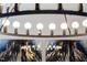Elegant chandelier with round bulbs hangs above modern art in this stylish home at 139 Pronghorn Deer Ct, Garner, NC 27529
