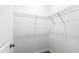 Bright, walk-in closet featuring wire shelving and a neutral carpet at 139 Pronghorn Deer Ct, Garner, NC 27529