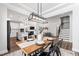 Open-concept dining area that flows seamlessly into the kitchen and living room at 139 Pronghorn Deer Ct, Garner, NC 27529