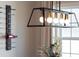 A close-up of the dining room lighting and decor at 139 Pronghorn Deer Ct, Garner, NC 27529