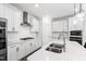 New kitchen featuring stainless steel appliances, white cabinets, and gas cooktop at 139 Pronghorn Deer Ct, Garner, NC 27529