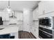 New kitchen featuring stainless steel appliances, white cabinets, and built in microwave at 139 Pronghorn Deer Ct, Garner, NC 27529