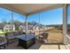 Screened-in porch featuring comfortable furniture and a beautiful community view at 139 Pronghorn Deer Ct, Garner, NC 27529
