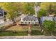 Beautiful aerial view of a meticulously landscaped home with a brick pathway at 1403 Wake Forest Rd, Raleigh, NC 27604