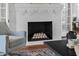 Close-up of the painted fireplace in the living room at 1403 Wake Forest Rd, Raleigh, NC 27604