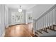 Inviting foyer with beautiful hardwood floors and a staircase at 1403 Wake Forest Rd, Raleigh, NC 27604
