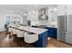 Stylish kitchen featuring a large island, stainless steel appliances, and pendant lighting at 1403 Wake Forest Rd, Raleigh, NC 27604