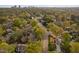 Serene aerial view showcases the neighborhood's lush greenery and tree-lined streets at 1403 Wake Forest Rd, Raleigh, NC 27604