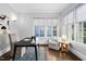 Bright home office with hardwood floors, natural light, and comfortable seating at 1403 Wake Forest Rd, Raleigh, NC 27604