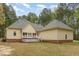 Rear exterior of the home with a covered porch at 15101 Aiken Rd, Wake Forest, NC 27587