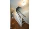 Inviting entryway featuring hardwood floors, stairs and neutral paint at 1523 Yarborough Park Drive, Raleigh, NC 27604