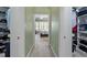 Walk-in closet with custom shelving and ample storage space for shoes and clothing at 1525 Marshall Farm St, Wake Forest, NC 27587